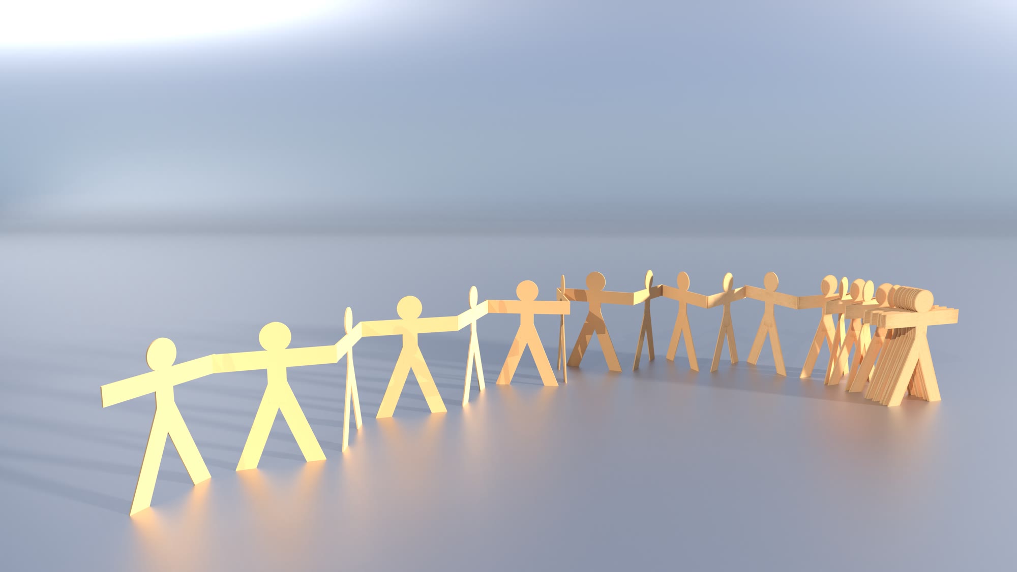 A chain of paper cut-out people holding hands
